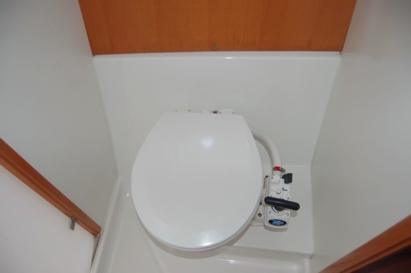 Head on owner's side with opening port.